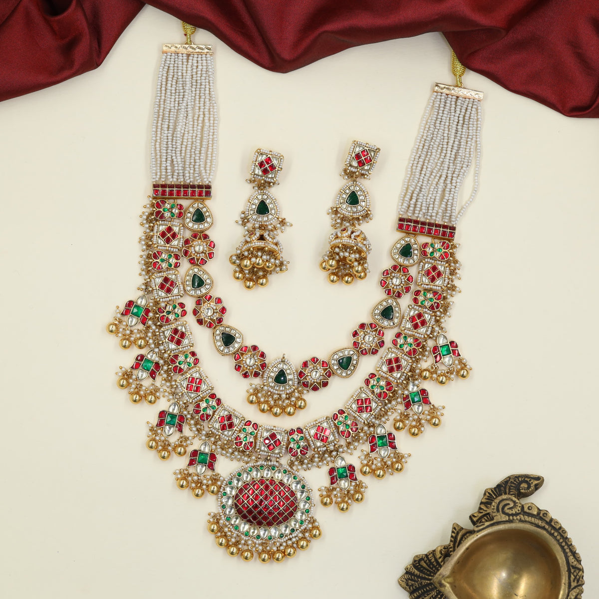 Signature Jadau Long Haara finished with floral clusters, framed sections and delicate fringe