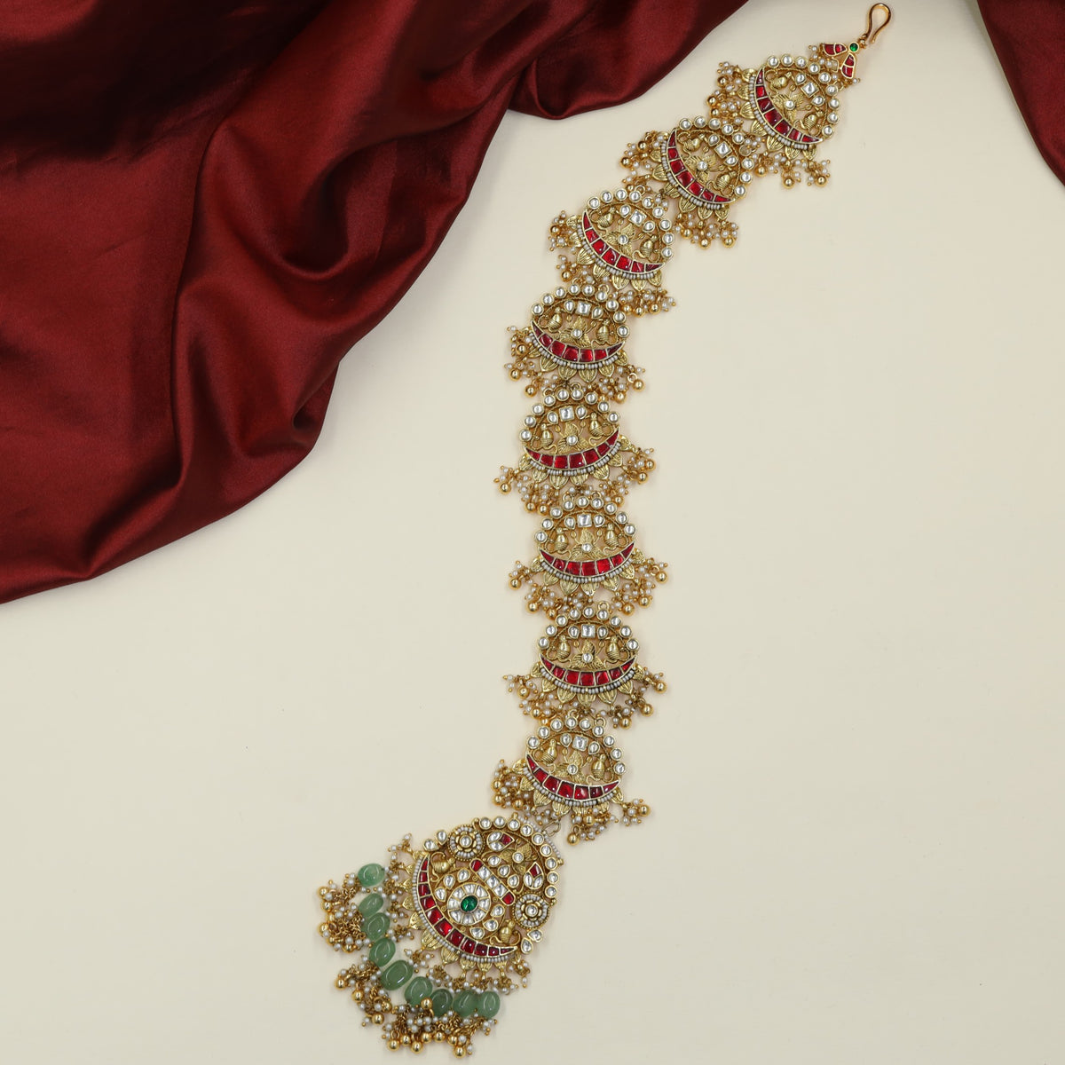 Regal Jadau Long Jade featuring intricate scalloped sections