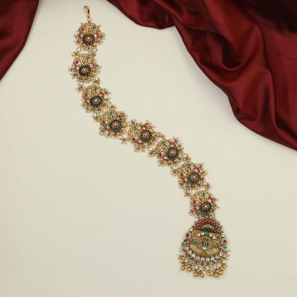 Grand Jadau Long Jades with decorative floral sections and hanging fringe