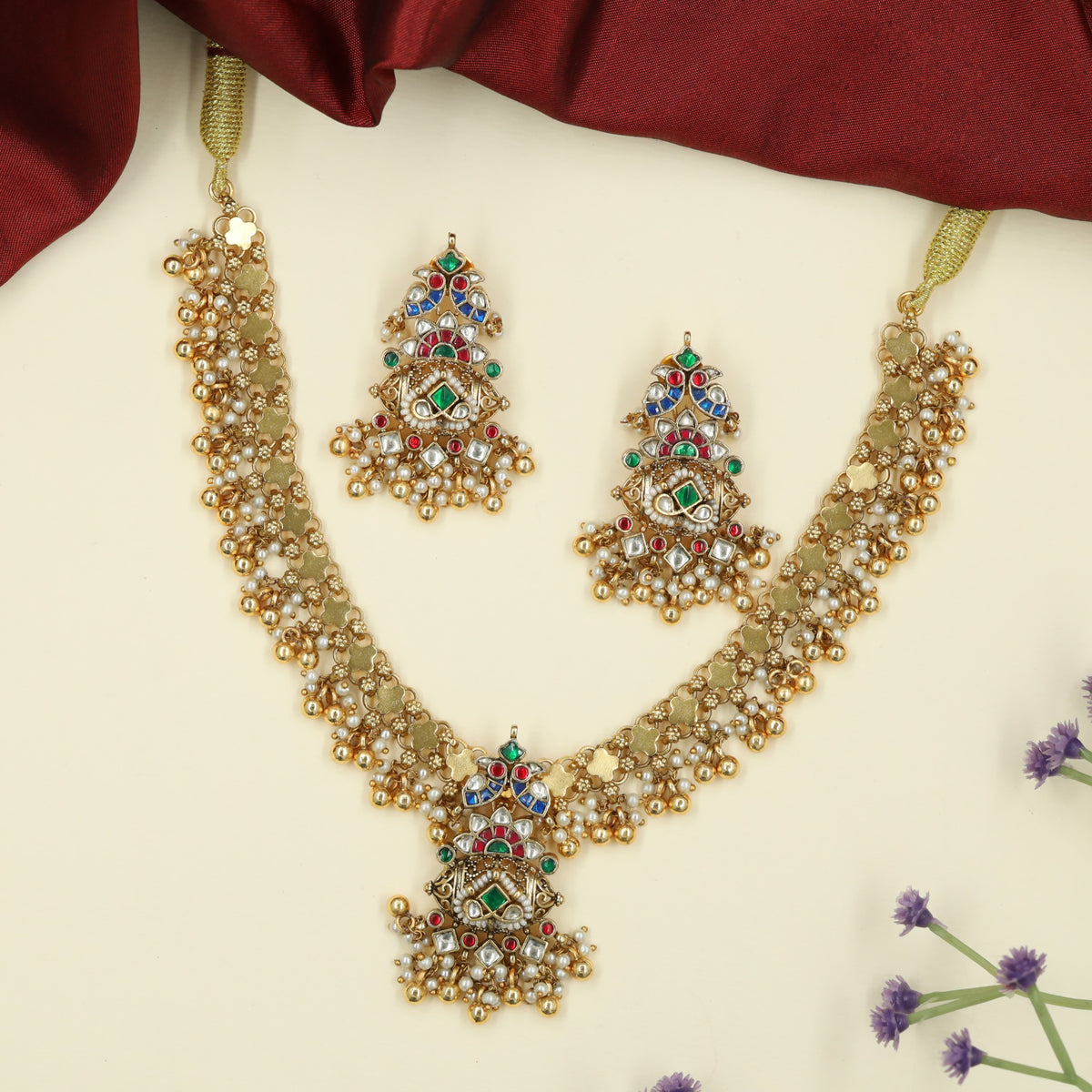 Jadau Necklace with Traditional Floral Links and Intricate Pendant Ornamentation
