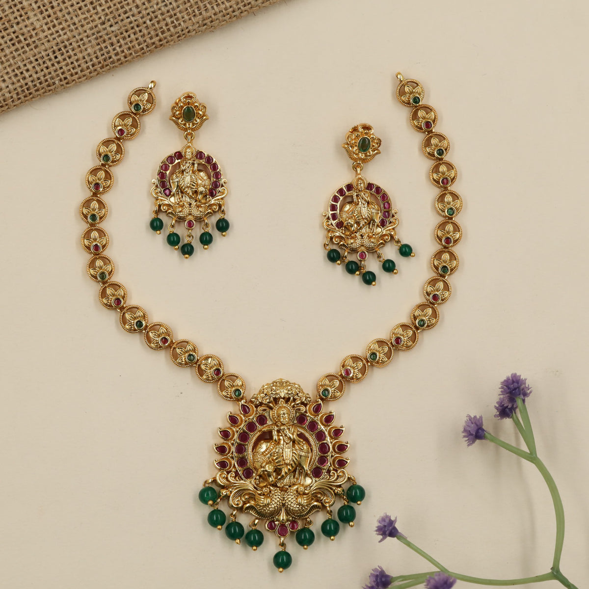 A heritage-inspired Antique Necklace showcasing Krishna and peacock detailing
