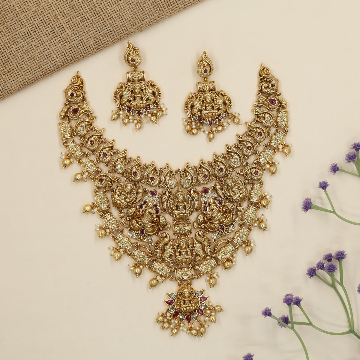 Grand Antique Necklace featuring Lakshmi artistry framed by elephants and peacock figures