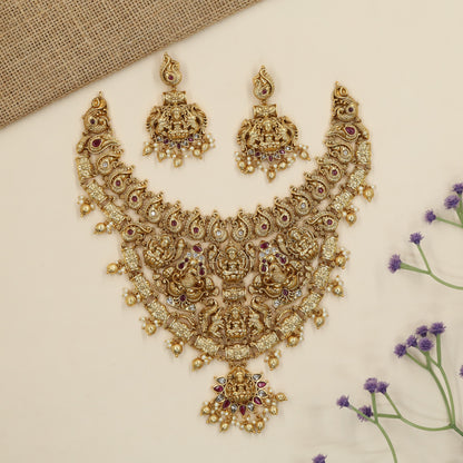 Grand Antique Necklace featuring Lakshmi artistry framed by elephants and peacock figures