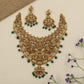 Grand Antique Necklace featuring Lakshmi artistry framed by elephants and peacock figures