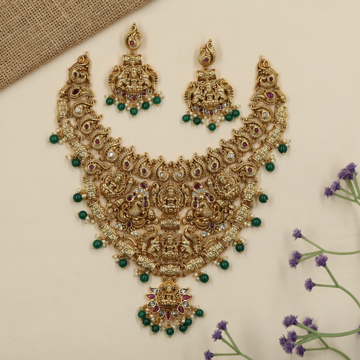 Grand Antique Necklace featuring Lakshmi artistry framed by elephants and peacock figures