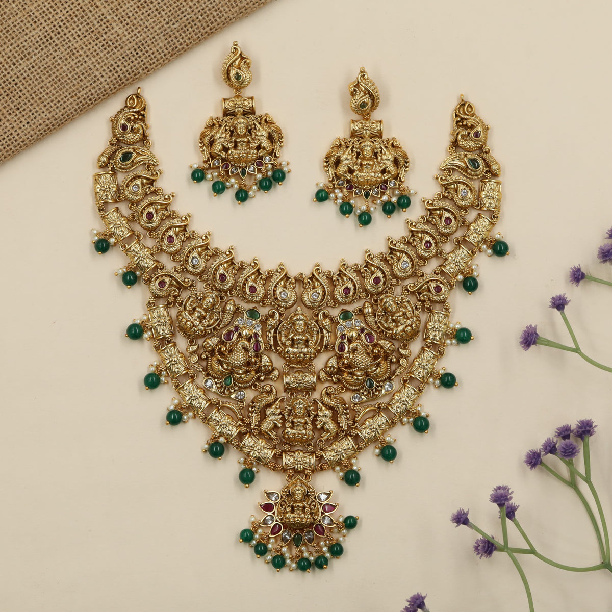 Grand Antique Necklace featuring Lakshmi artistry framed by elephants and peacock figures
