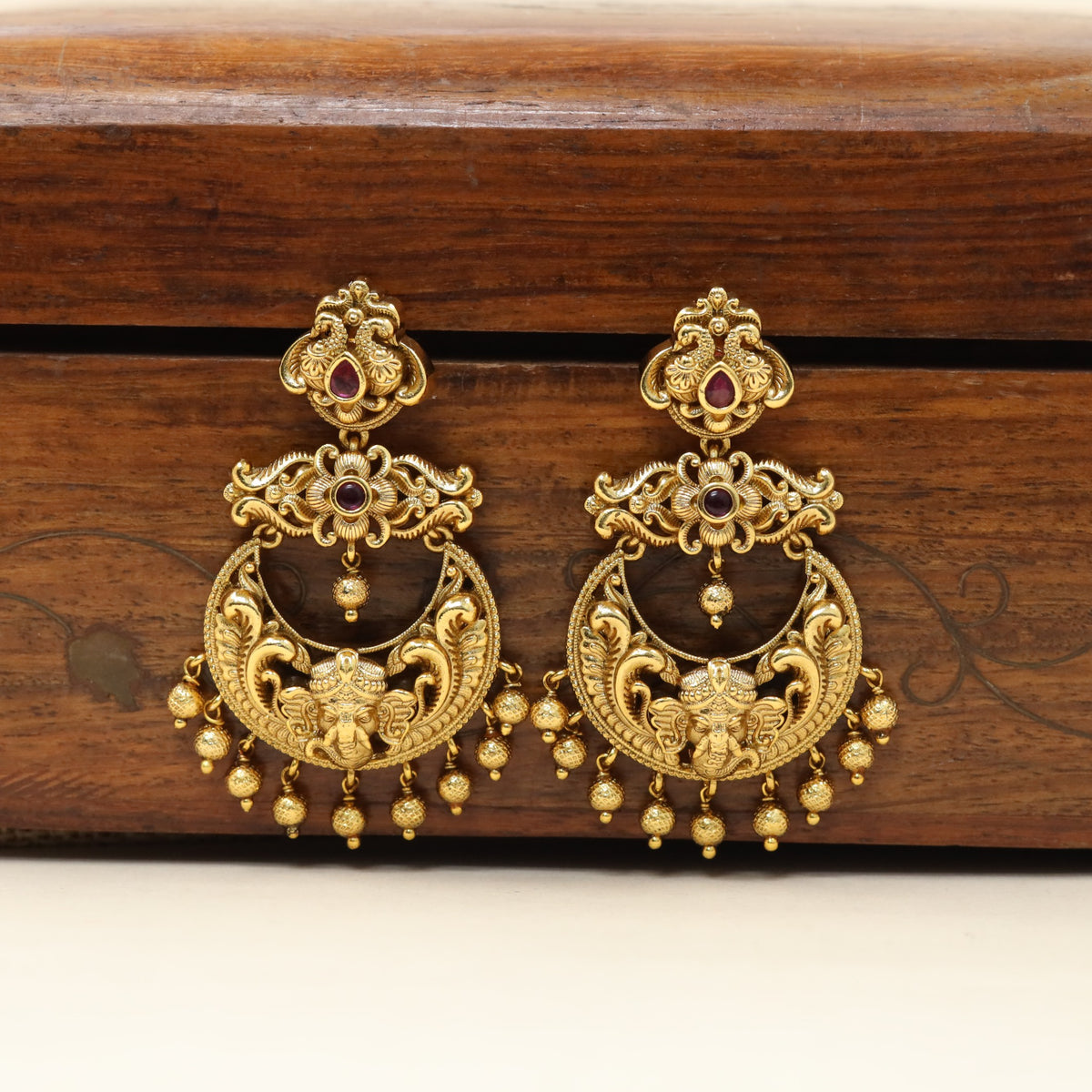 Antique Hanging with intricate scrollwork and suspended ornamental drops