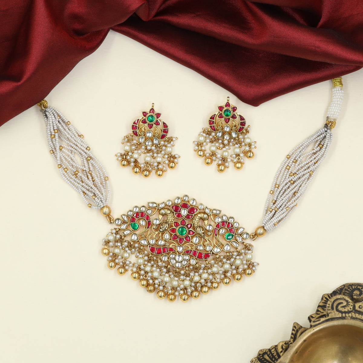 Jadau Choker with graceful peacock detailing and floral artistry