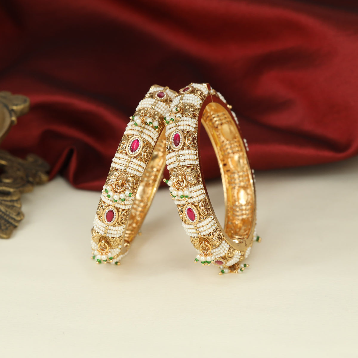 Richly Detailed Antique Bangless with Repeating Oval Settings and Beadwork