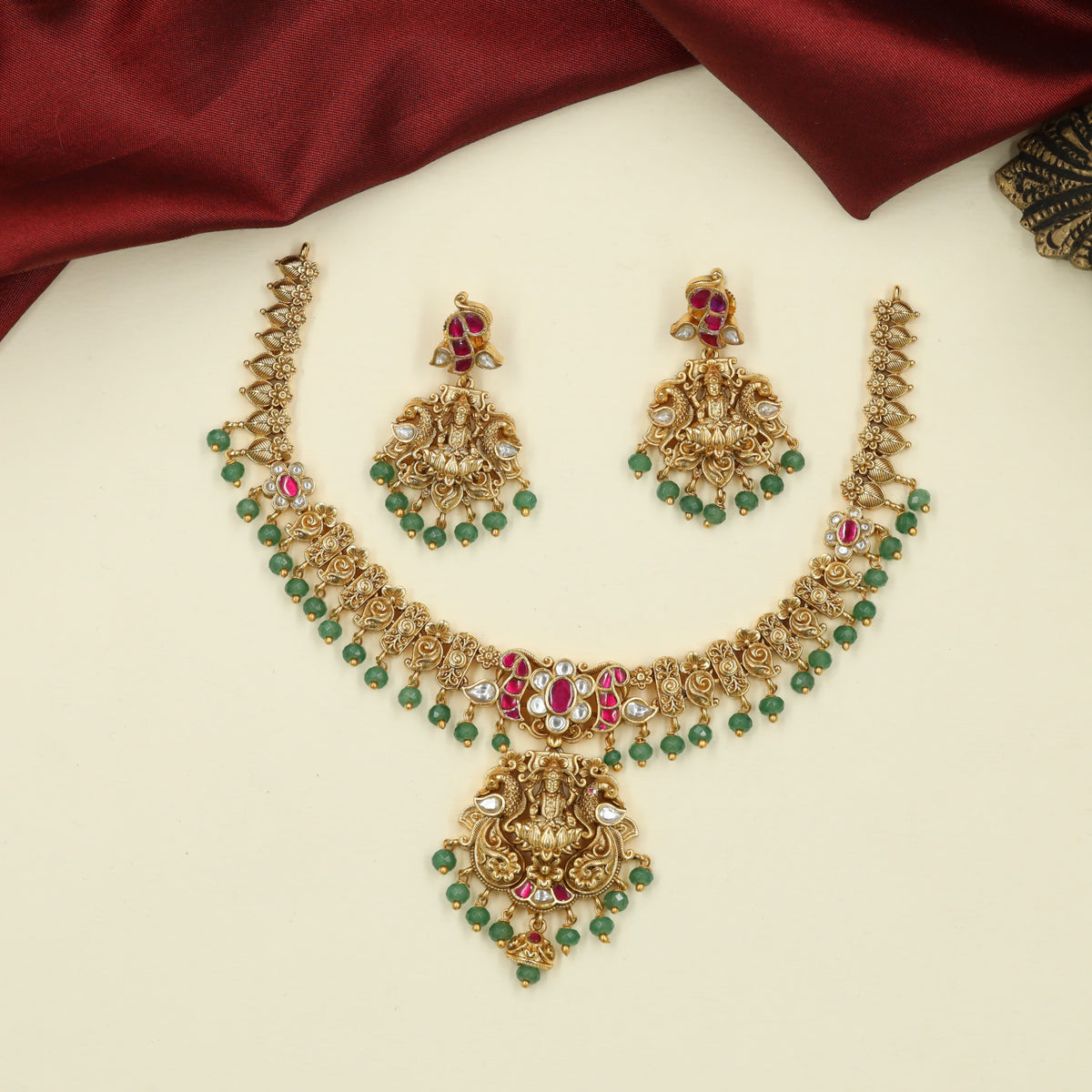 Richly Crafted Antique Necklace featuring Sculpted Lakshmi and Fine Floral Ornamentation