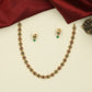 Traditional Necklace with Repeating Round Accents and Intricate Decorative Links