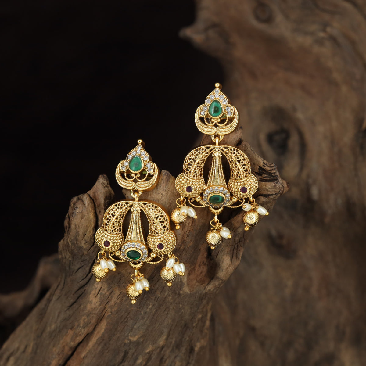 Fine Antique Hangings with Teardrop Accents and Sculpted Decorative Panels