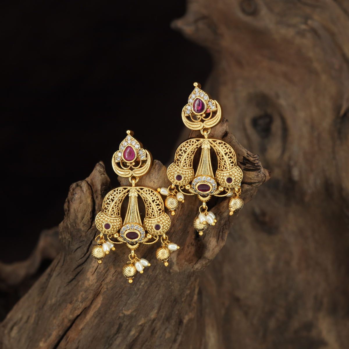 Fine Antique Hangings with Teardrop Accents and Sculpted Decorative Panels