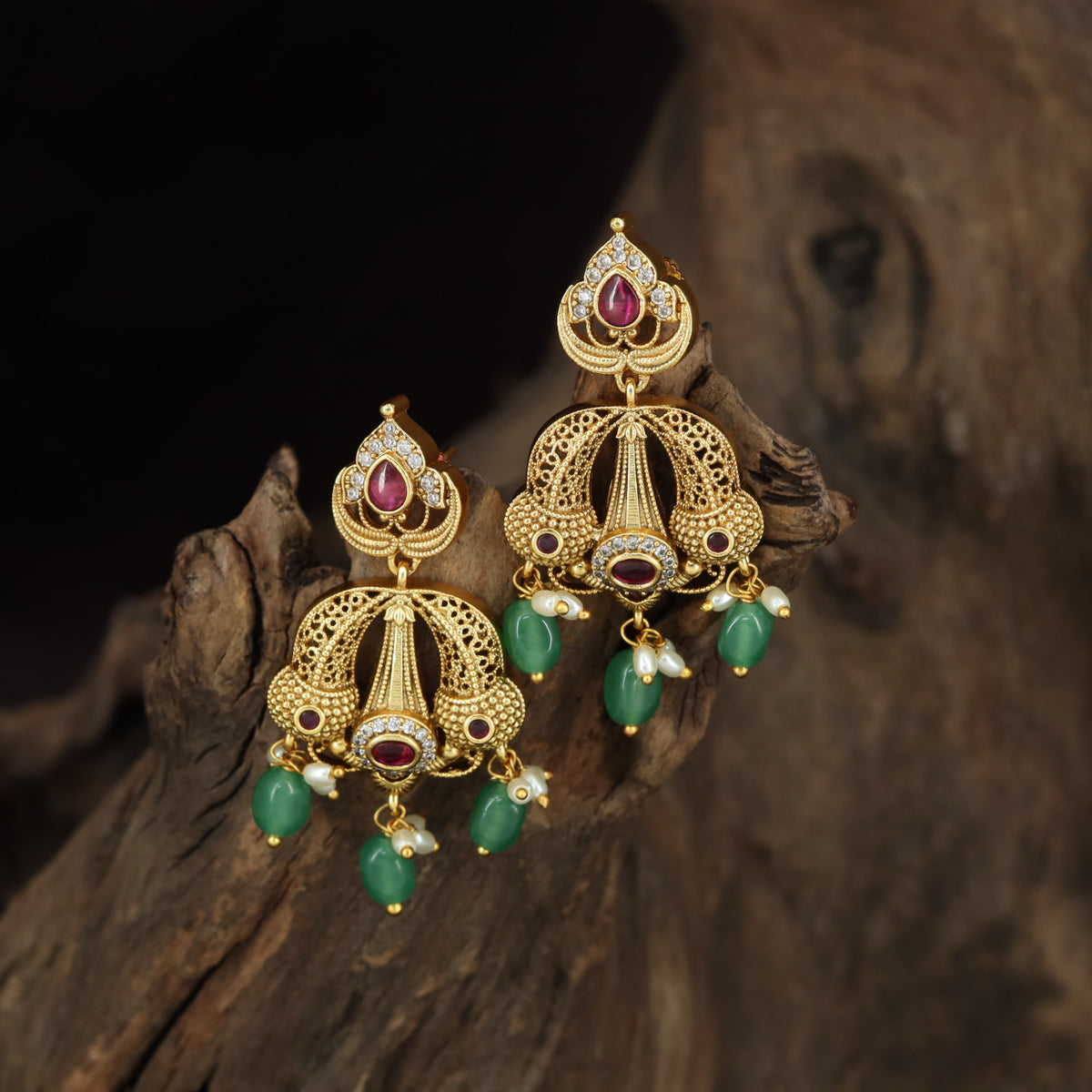 Fine Antique Hangings with Teardrop Accents and Sculpted Decorative Panels