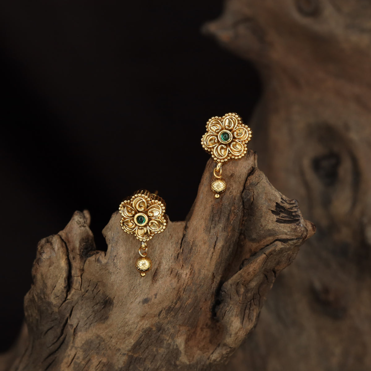 Antique Stud with Symmetrical Floral Elements and Fine Border Detailing