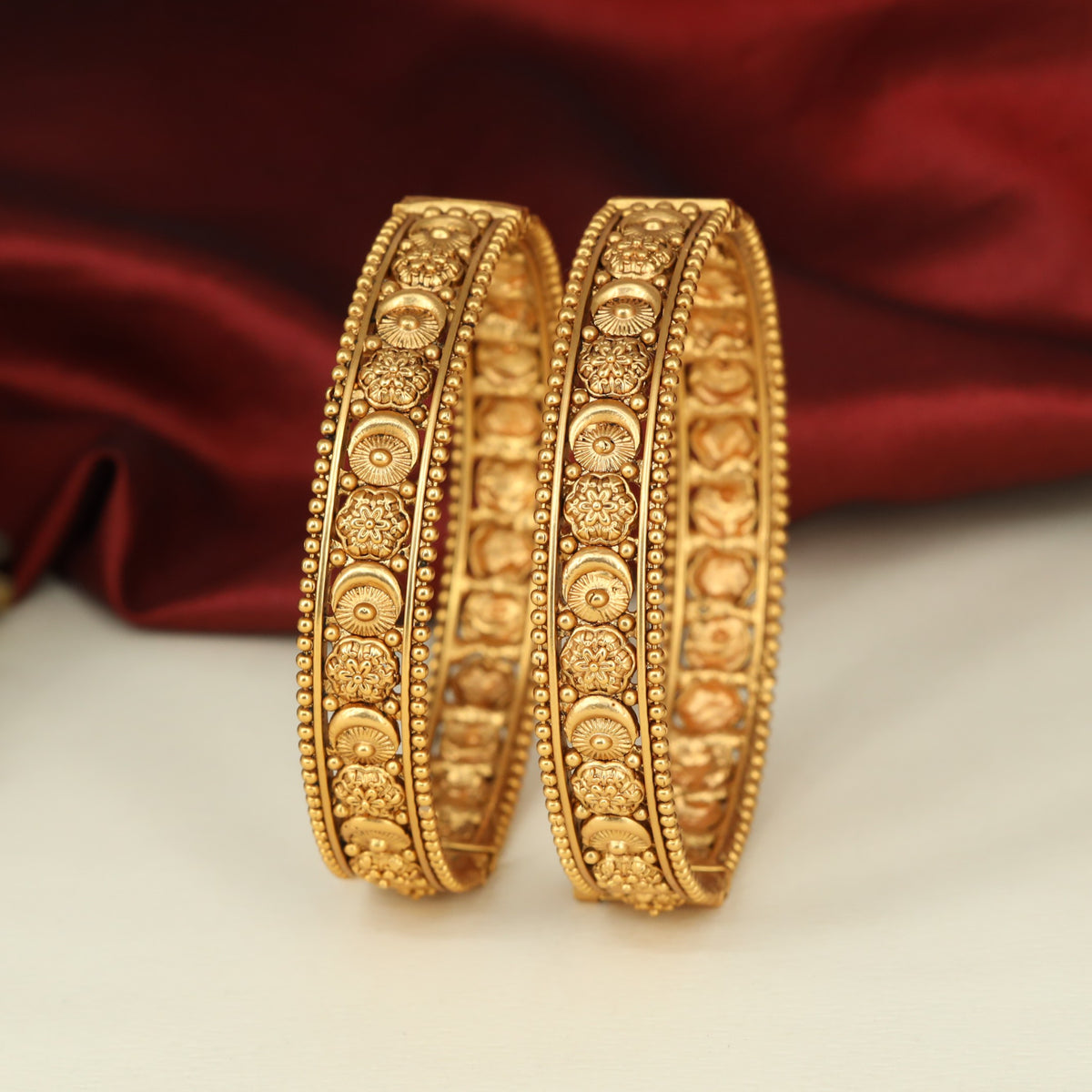 Grand Antique Bangless with Elaborate Floral Panels and Radiant Disc Accents