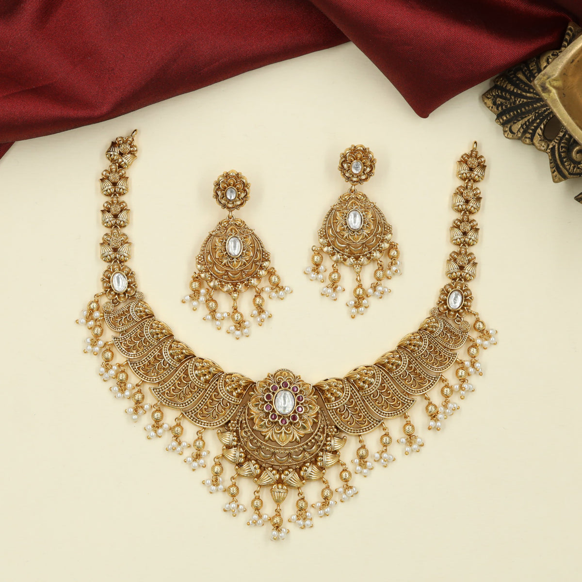 Heritage Necklace featuring Sculpted Floral Links and a Detailed Centre Pendant