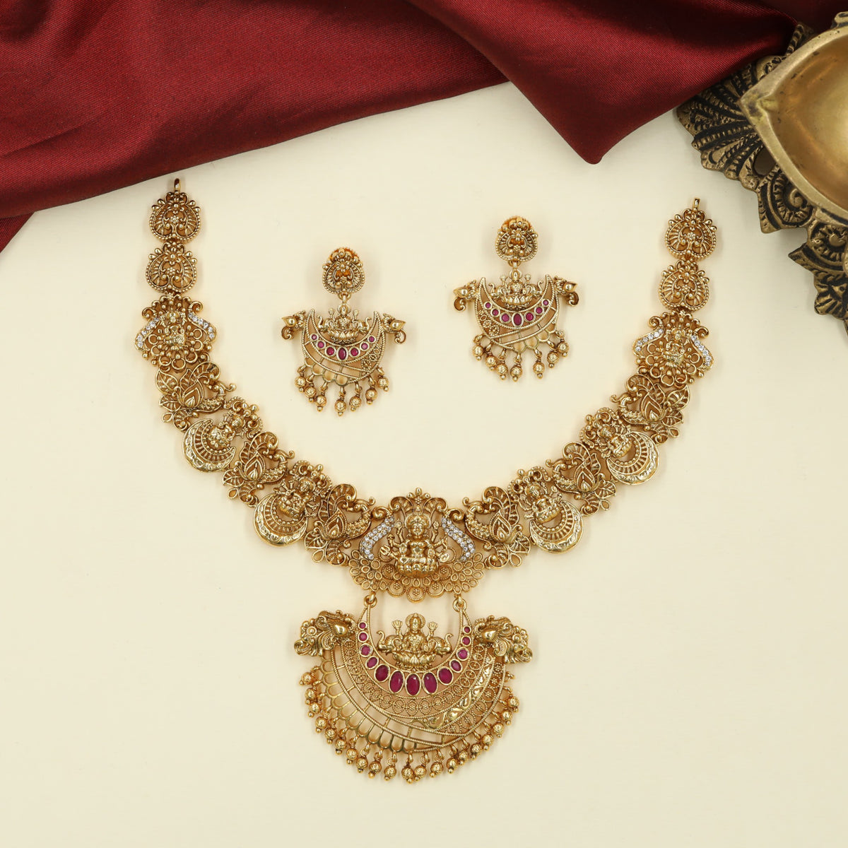Classic Antique Necklace with Sculpted Lakshmi Detailing and Symmetrical Floral Panels