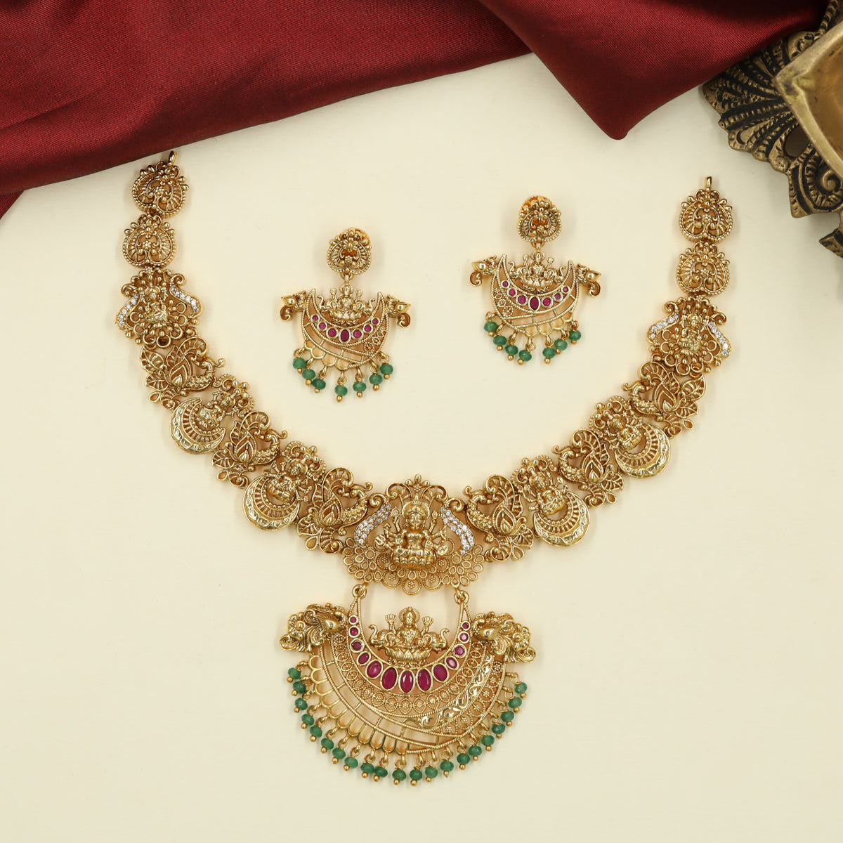 Classic Antique Necklace with Sculpted Lakshmi Detailing and Symmetrical Floral Panels