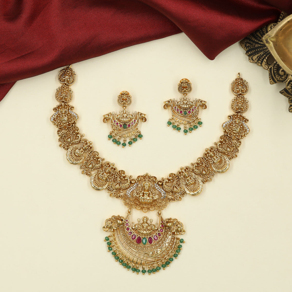 Classic Antique Necklace with Sculpted Lakshmi Detailing and Symmetrical Floral Panels