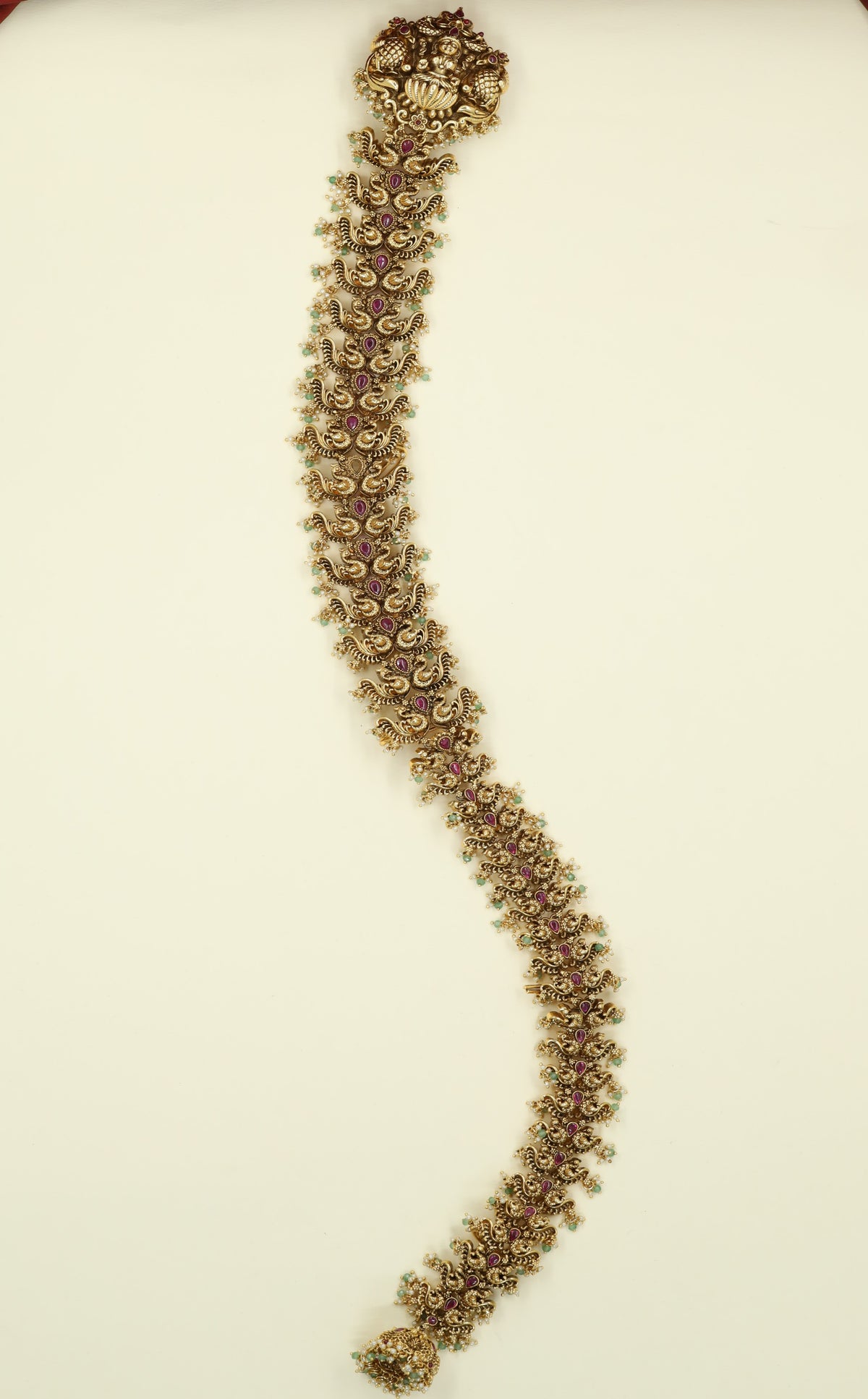 Detailed Antique Long Jade with Repeating Floral Forms and Sculpted Ornamentation