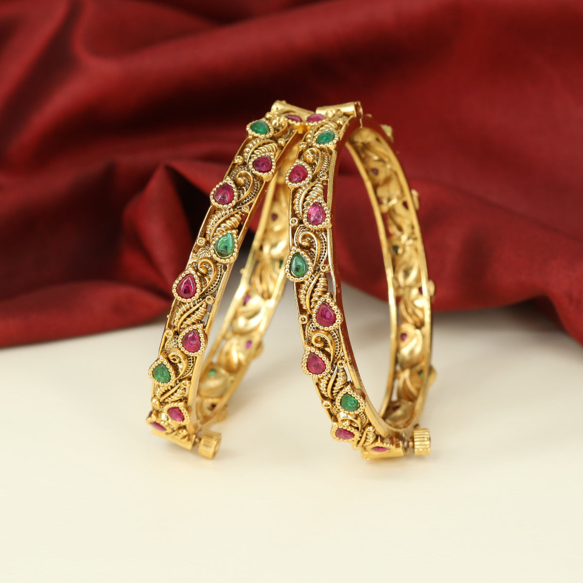 A Traditional Antique Bangles design with Sculpted Leaf Forms and Decorative Accents