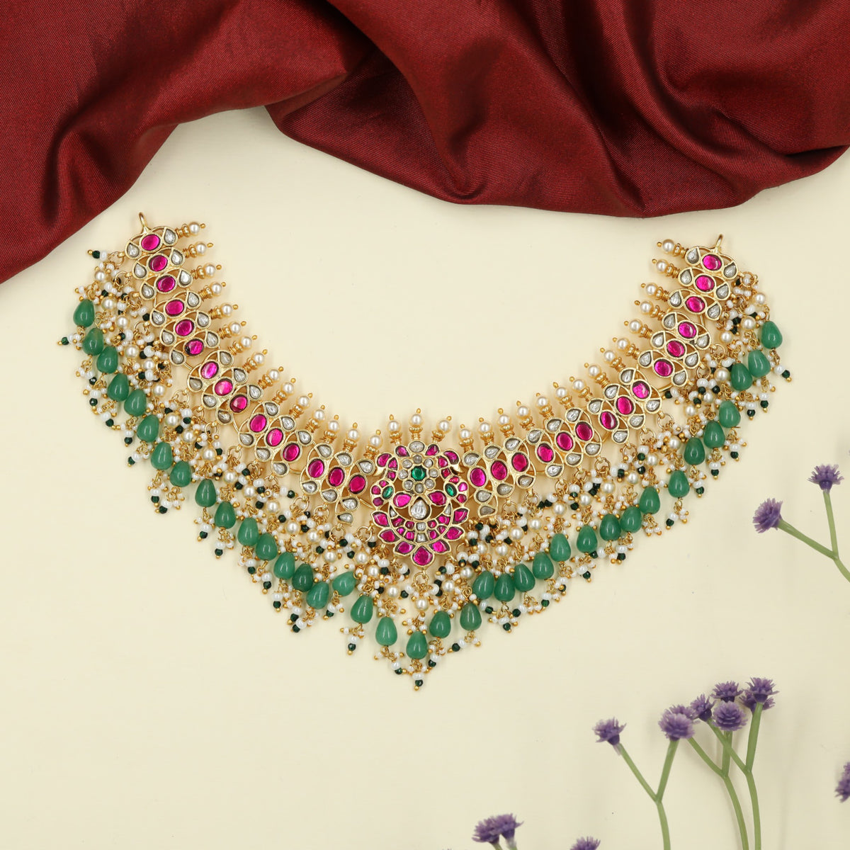 Jadau Necklace with Central Floral Panel and Repeating Decorative Accents