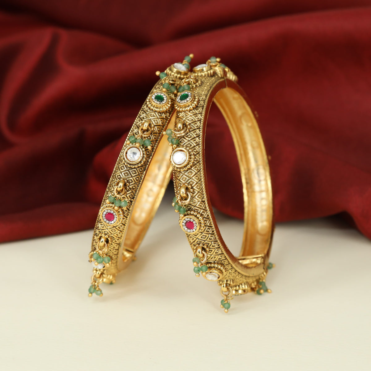Antique Bangles with Geometric Panels and Delicate Bead Drops