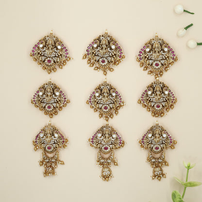 Traditional Antique Jade BIlle featuring Lakshmi Relief and Detailed Hanging Elements