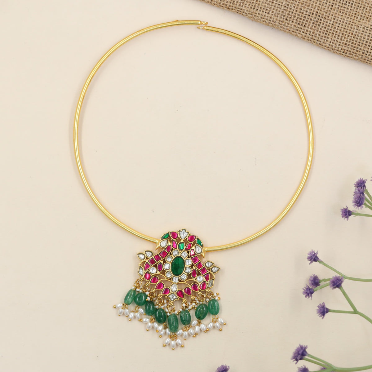 Jadau Necklace with Sculpted Peacock Elements and Ornamental Pendant Work