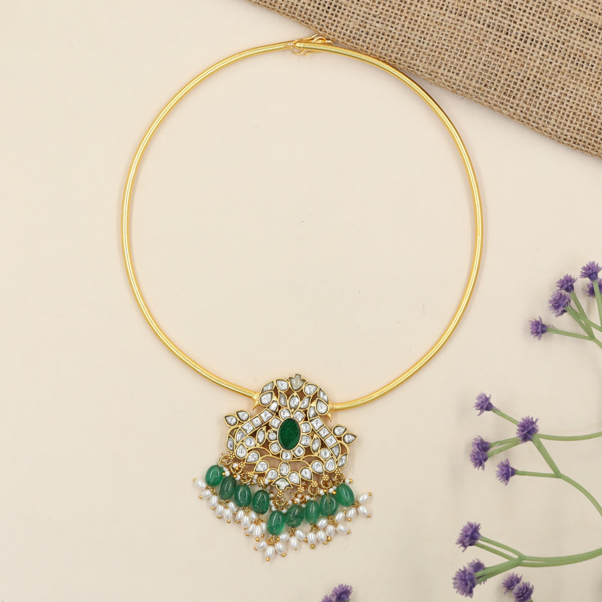 Jadau Necklace with Sculpted Peacock Elements and Ornamental Pendant Work