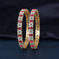 Gj Bangles designed with alternating oval elements and delicate flower shaped clusters