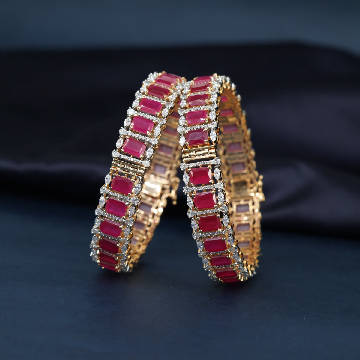 Contemporary Gj Bangles with structured links and intricate accents