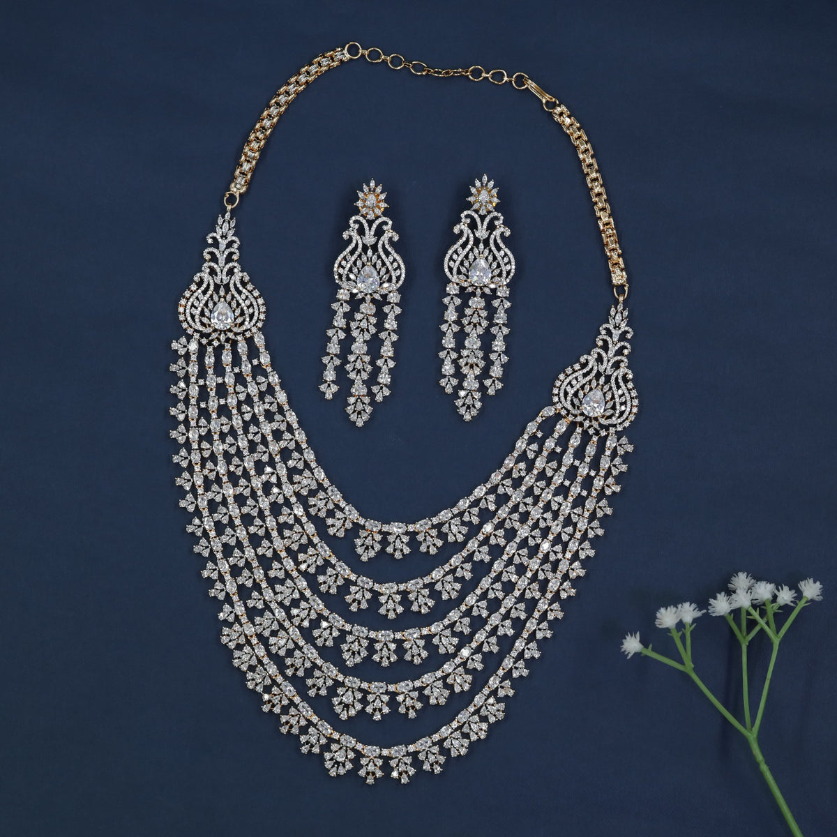 Gj Necklace designed with Multiple Curved Strands and Detailed Openwork