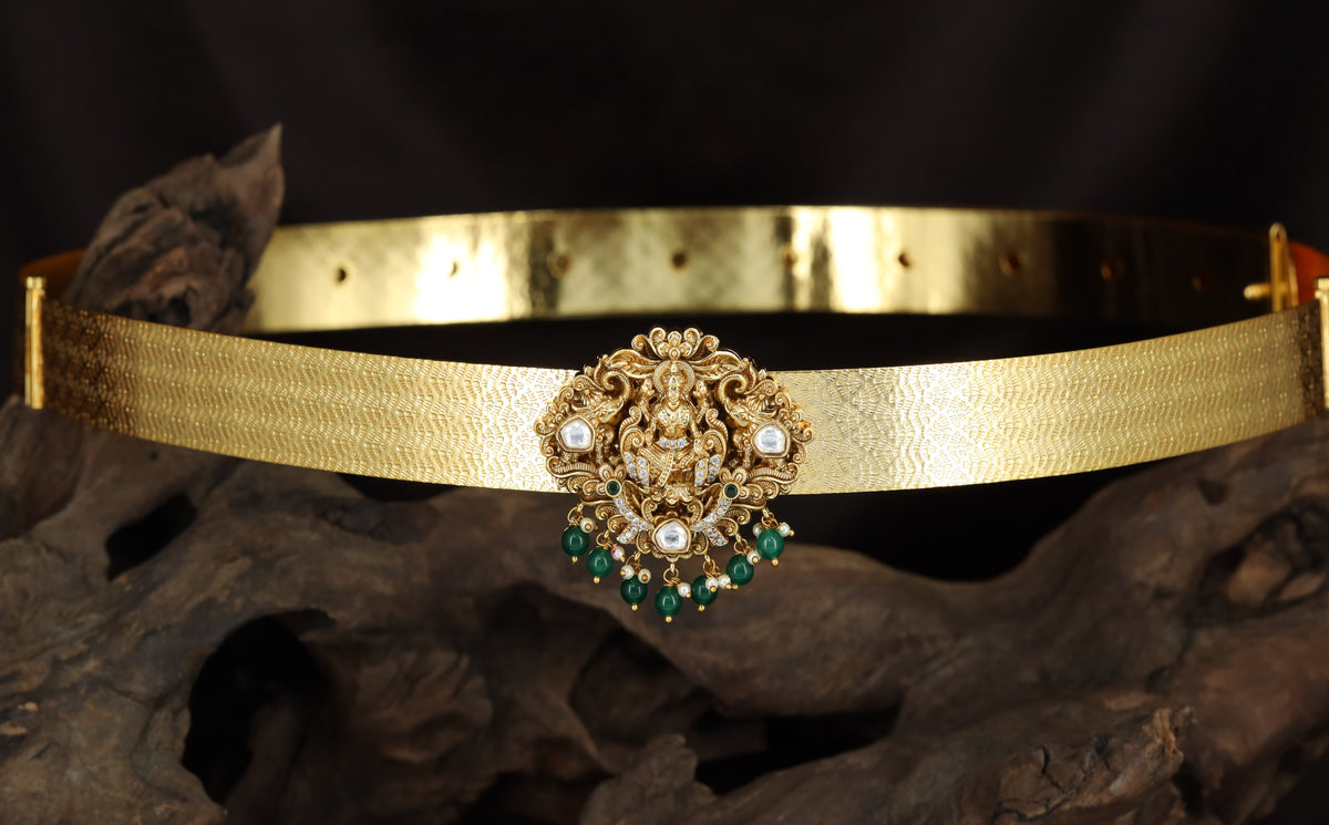 Antique Dabu with detailed Lakshmi design and hanging drops