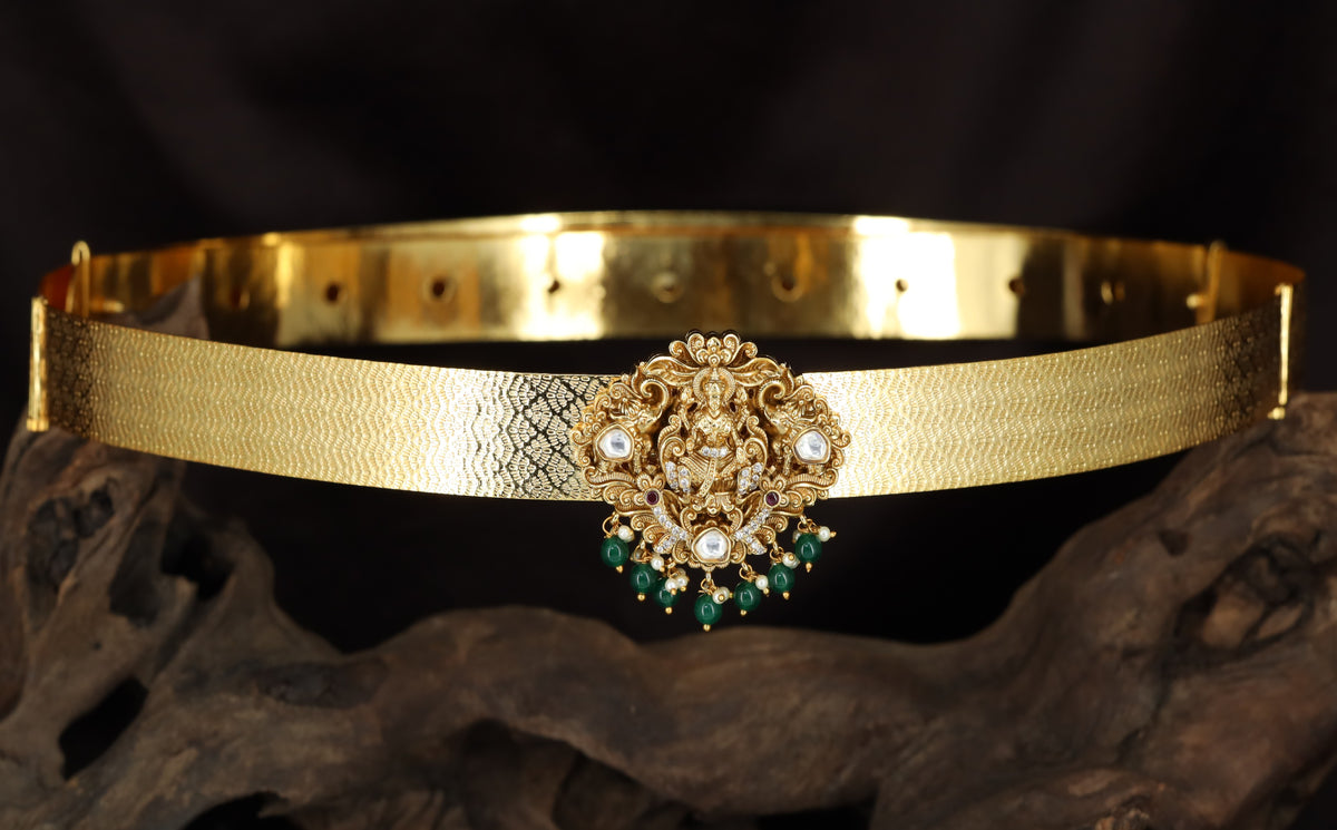 Antique Dabu with detailed Lakshmi design and hanging drops