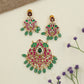 Jadau Pendant with decorative hanging elements and peacock inspired earrings
