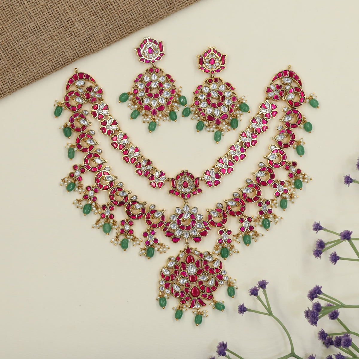 Jadau Necklaces with floral detailing and ornate pendants
