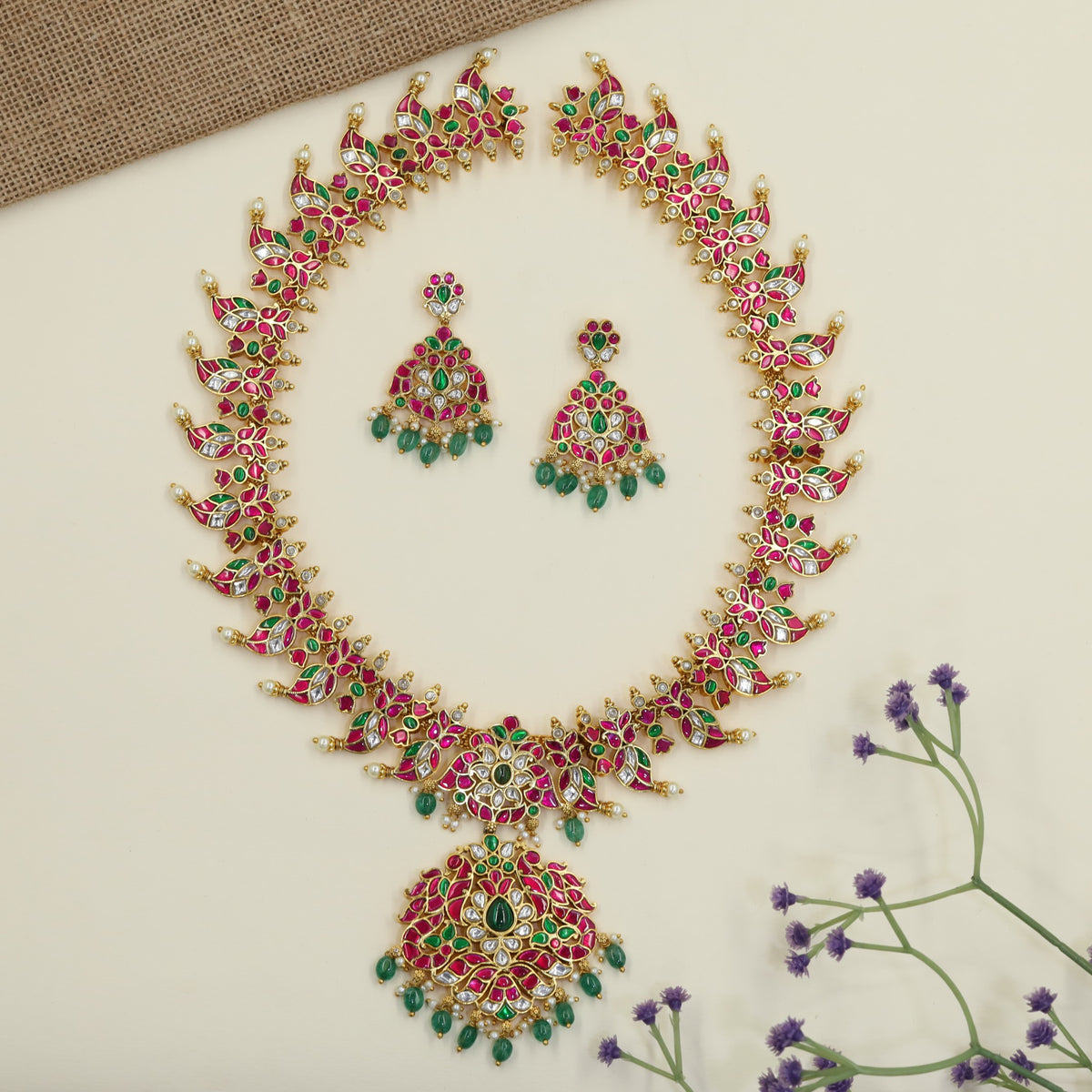 Traditional Jadau Long Haar featuring an ornate peacock pendant