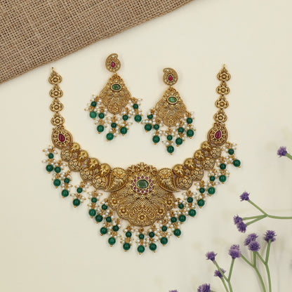 Antique Necklace with intricate floral detailing and paisley elements