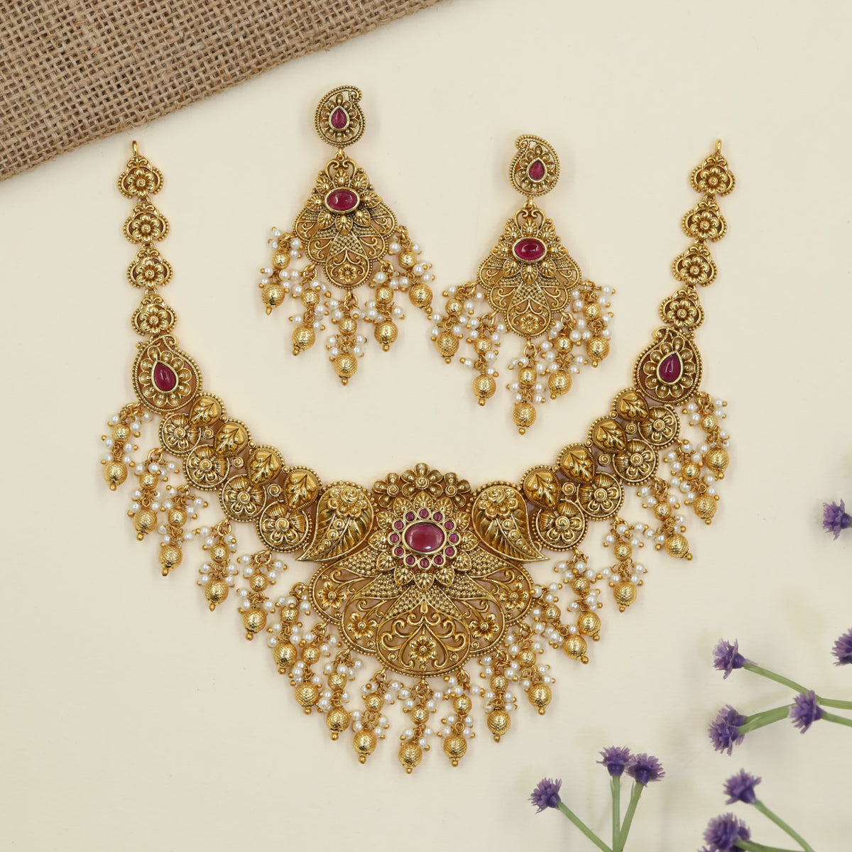 Antique Necklace with intricate floral detailing and paisley elements