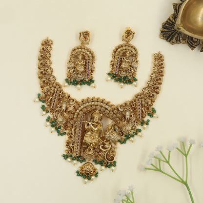 Antique Necklace featuring Krishna centerpiece with symmetrical Peacock detailing