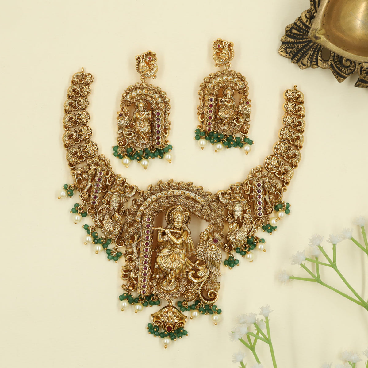 Antique Necklace featuring Krishna centerpiece with symmetrical Peacock detailing