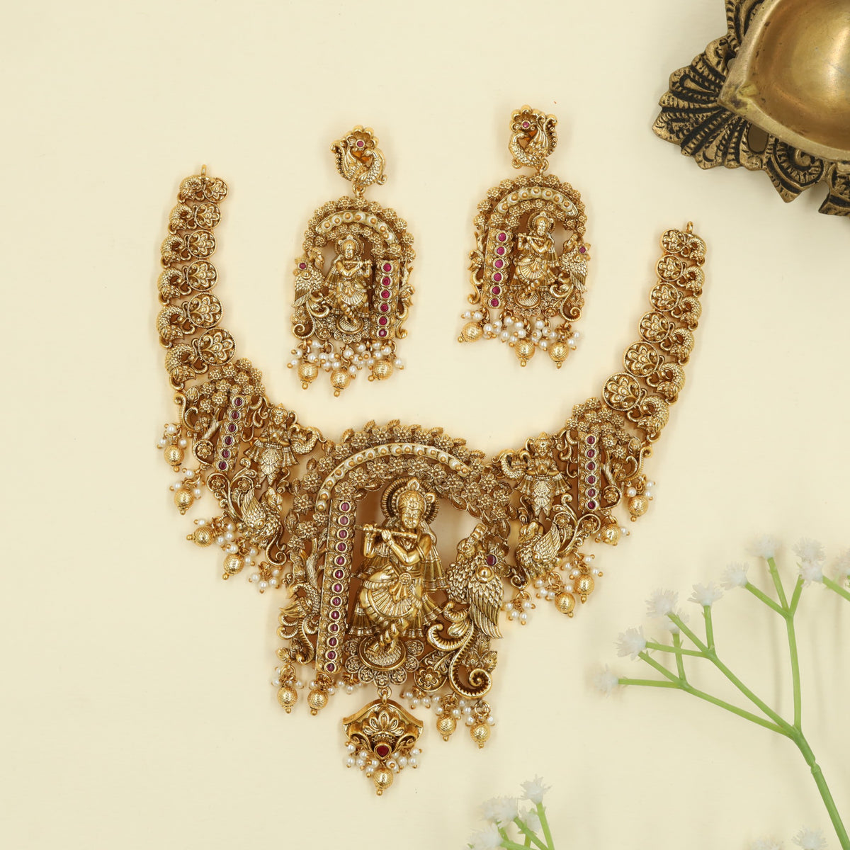Antique Necklace featuring Krishna centerpiece with symmetrical Peacock detailing