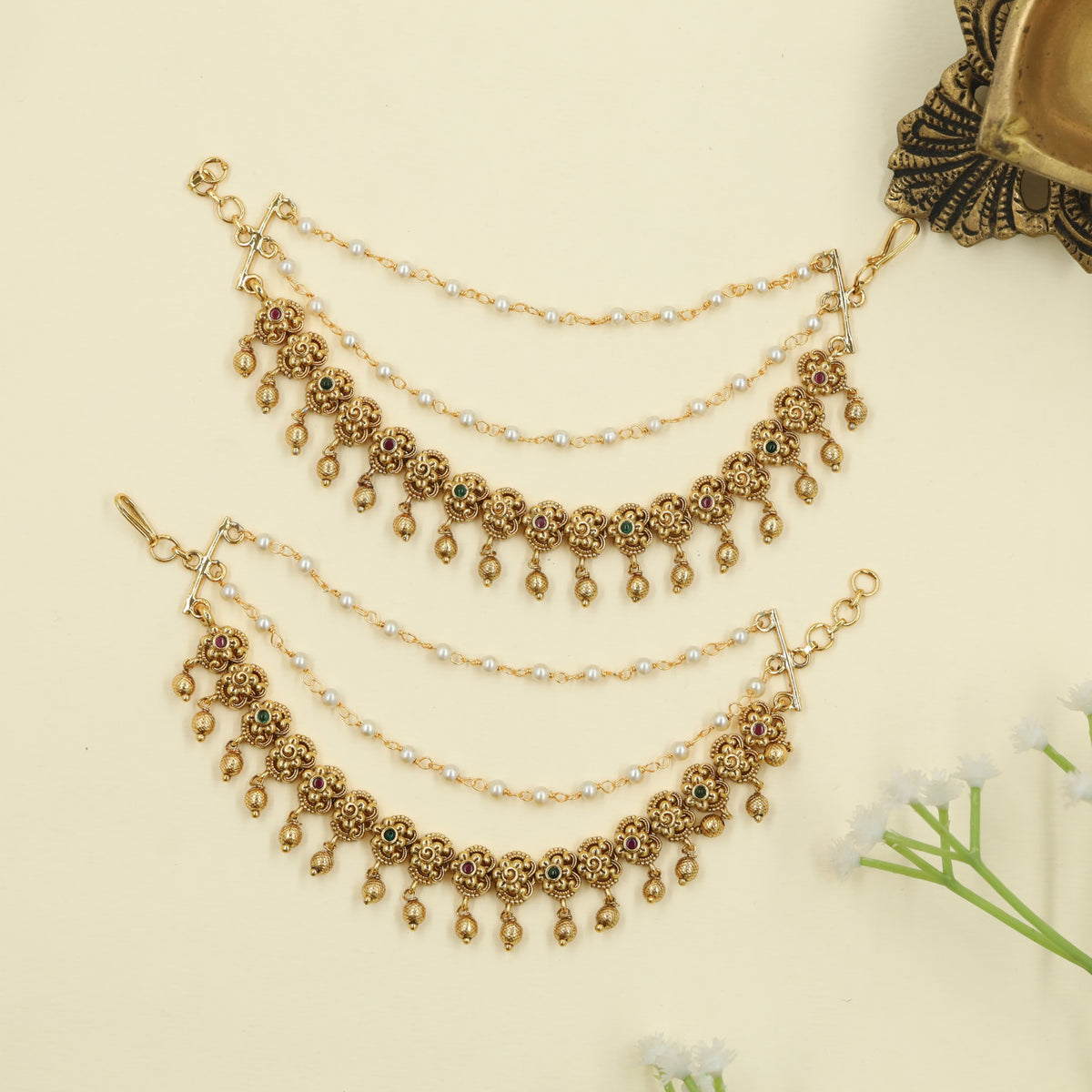 Antique Mati with floral link and hanging drop detailing