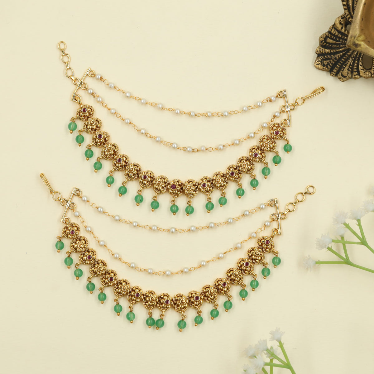 Antique Mati with floral link and hanging drop detailing