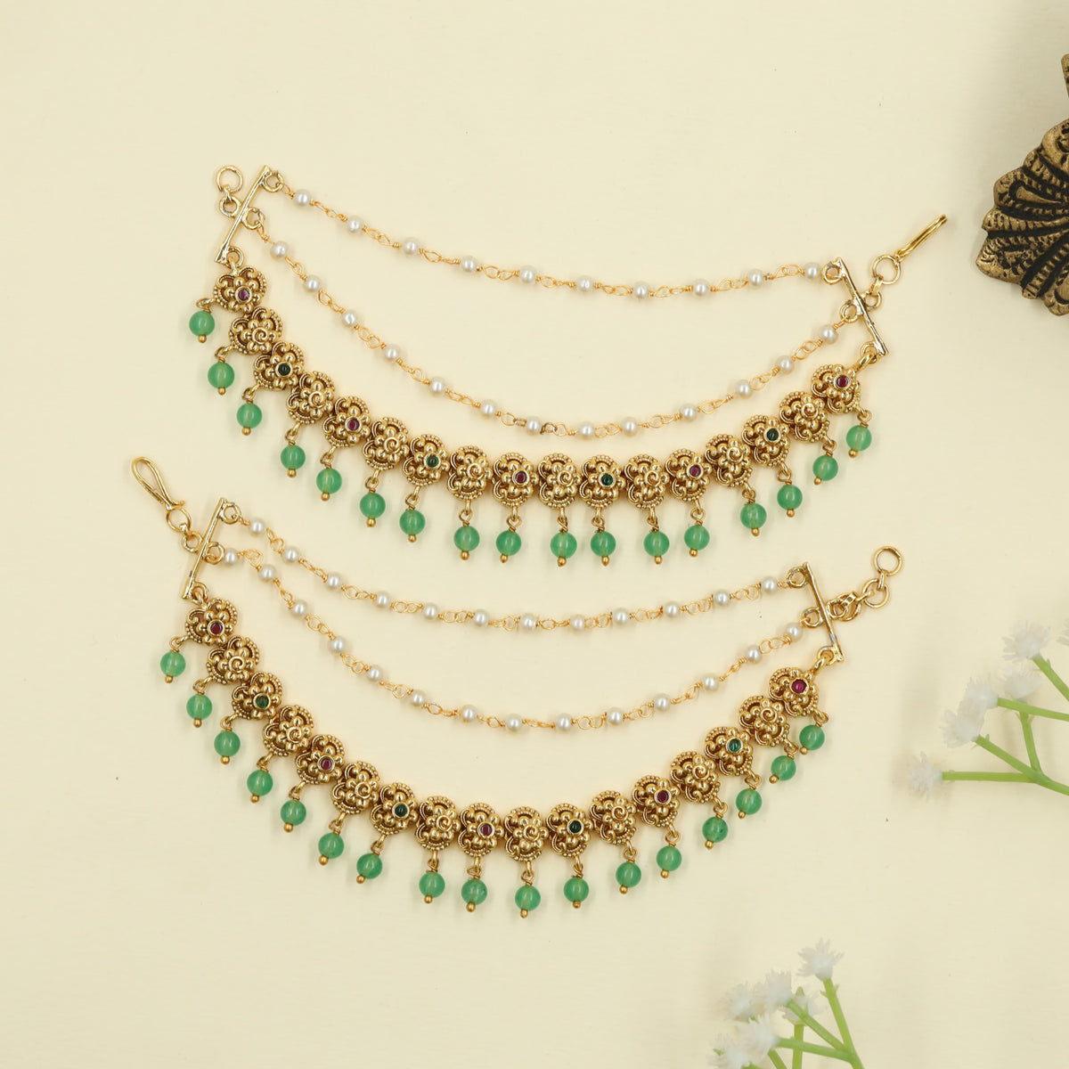 Antique Mati with floral link and hanging drop detailing