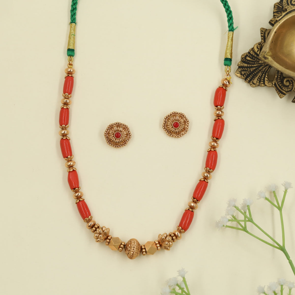 Rounded Elongated Antique Beads Necklace Set with Florals