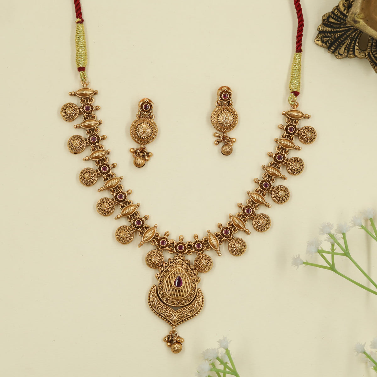 Antique Necklace with circular medallion detailing and a statement pendant