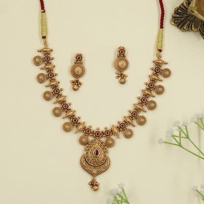 Antique Necklace with circular medallion detailing and a statement pendant